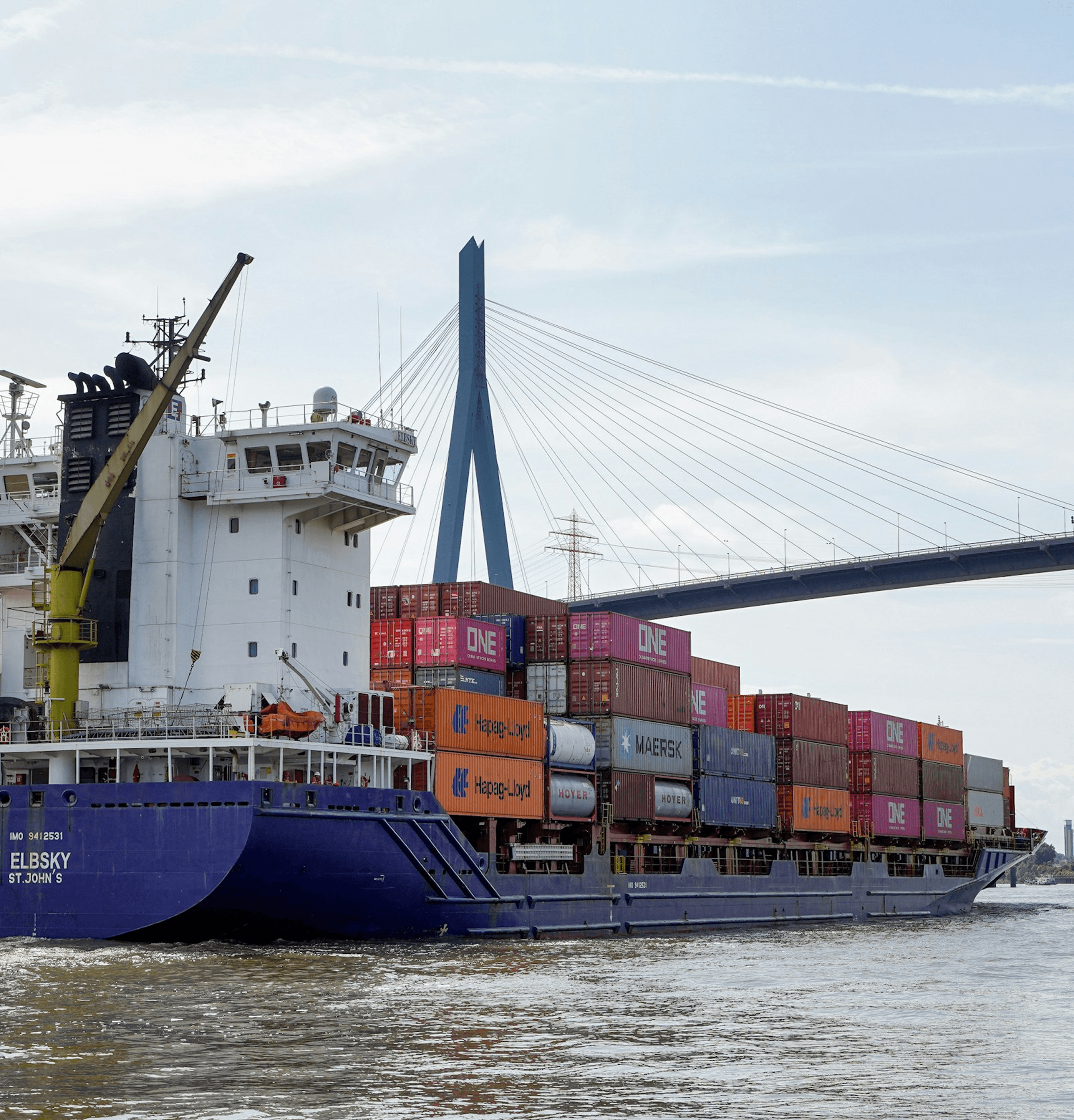 Cargo ship and bridge
